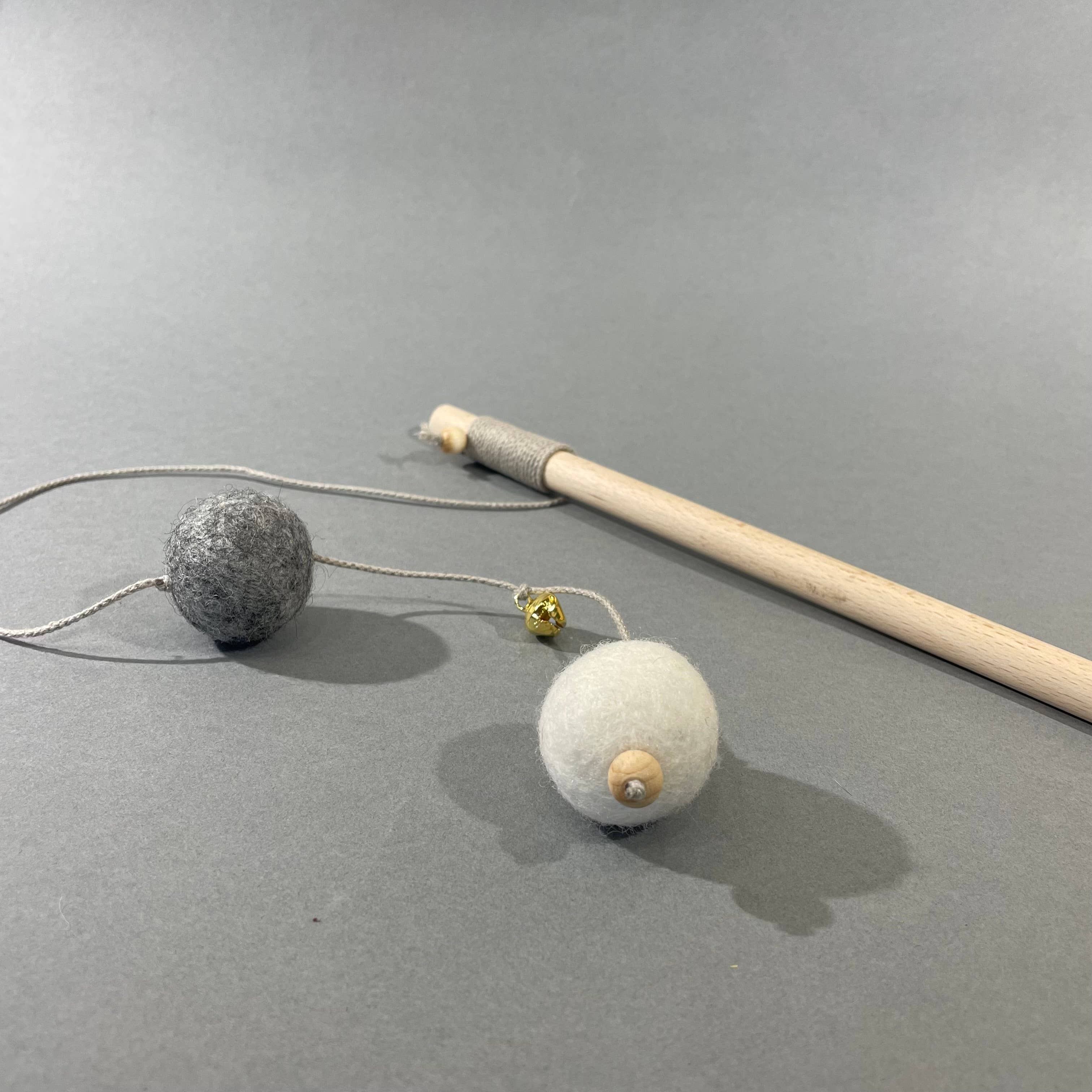 Cat teaser toy with wool balls and bell